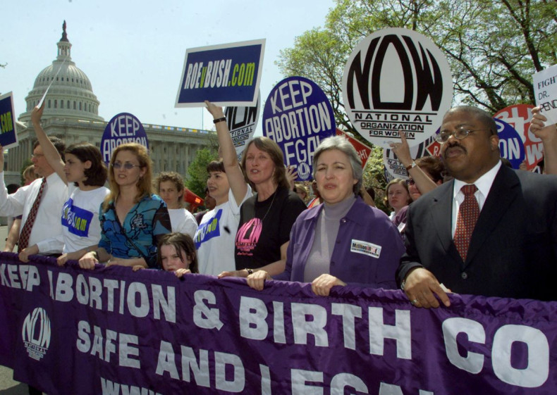 National Organization for Women president Patricia Ireland (C) marches with pro-choice supporters past the U.S. Capitol Building in Washington April 22, 2001./File Photo