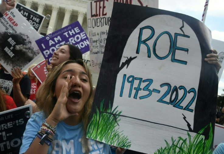 Anti-abortion activists celebrate outside the US Supreme Court
