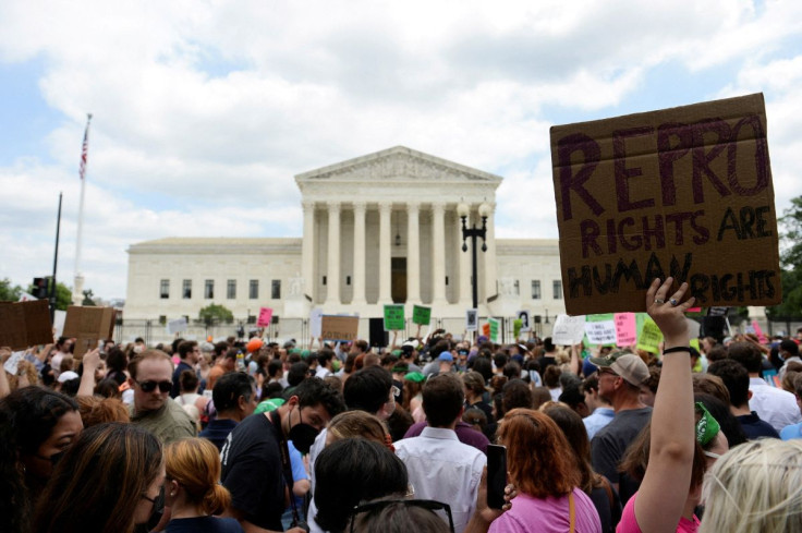 Abortion rights supporters demonstrate outside the United States Supreme Court as the court rules in the Dobbs v Womenâs Health Organization abortion case, overturning the landmark Roe v Wade abortion decision, in Washington, U.S.,  June 24, 2022. 
