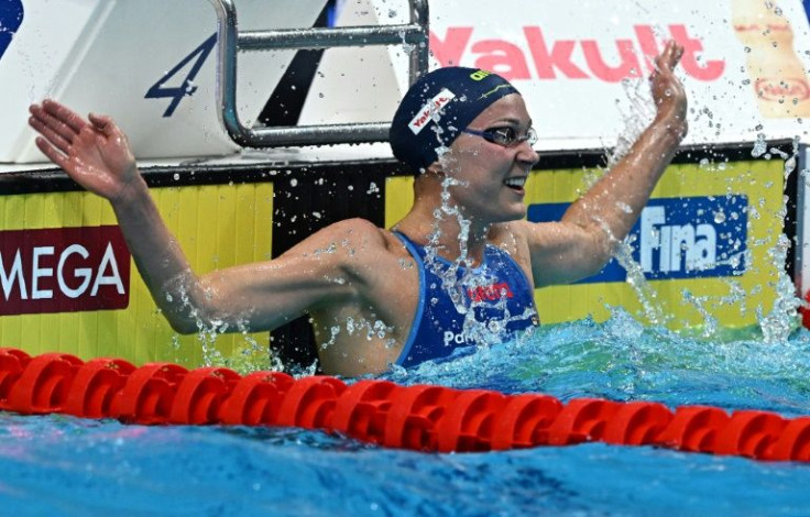 Sarah Sjostrom takes a moment to enjoy her women's 50m butterfly gold at the  World Swimming Championships
