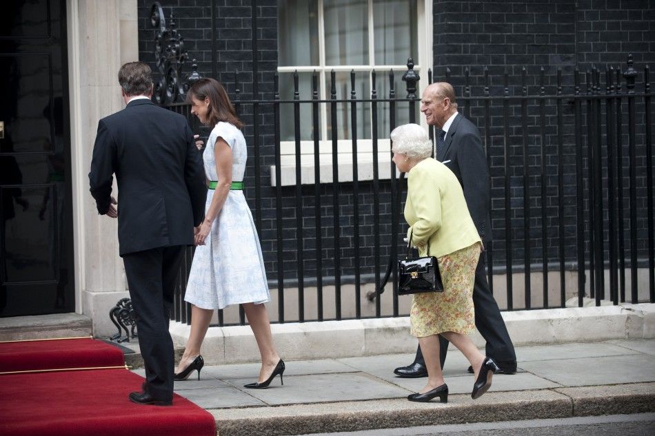 Britain039s Queen Elizabeth and Prince Philip follow Prime Minister David Cameron and his wife Samantha as they arrive for a lunch at number 10 Downing Street in London