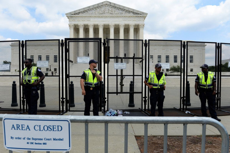 Supreme Court Police line up outside the United States Supreme Court as the court rules in the Dobbs v Women's Health Organization abortion case, overturning the landmark Roe v Wade abortion decision in Washington, U.S., June 24, 2022. 