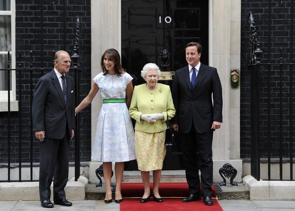 Prince Phiilp and Queen Elizabeth pose with Britain039s Prime Minister David Cameron and his wife Samantha before lunch at Downing Street in London