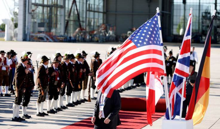 People prepare for arrivals of G7 leaders at Franz-Josef-Strauss airport in Munich to attend the G7 summit, which will take place in the Bavarian alpine resort of Elmau Castle, Germany, June 25, 2022.