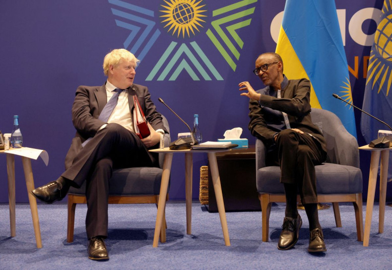 British Prime Minister Boris Johnson and Rwandan President Paul Kagame attend the Leaders' Retreat executive session on the sidelines of the 2022 Commonwealth heads of Government meeting at the Intare Conference centre in Kigali, Rwanda June 25, 2022. Dan