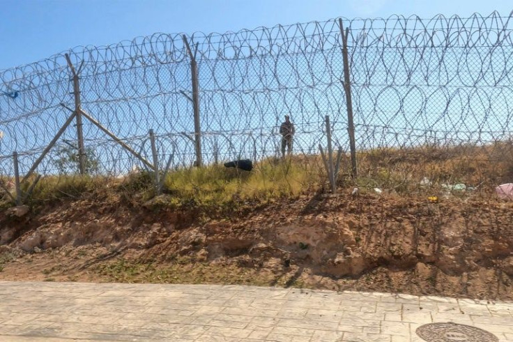 More than 500 people entered a border control area after cutting a fence with shears, Melilla authorities said