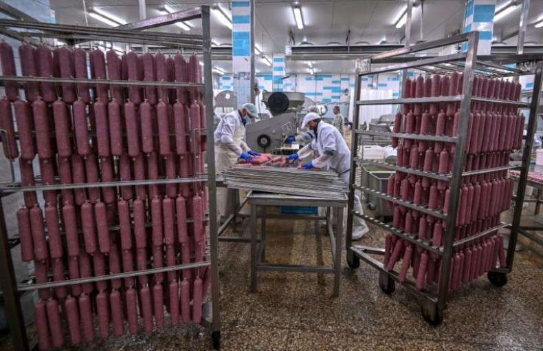 Workers produce sausages at Berdyansk Meat Processing Plant in Berdyansk