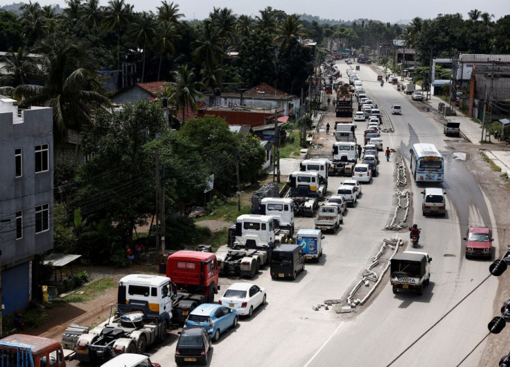 Vehicles queue for diesel and petrol as they wait for a bowser since yesterday, amid the country's economic crisis, in Colombo, Sri Lanka, June 23, 2022. 