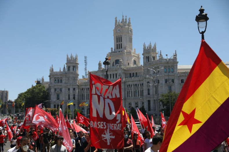 Demonstrators take part in an anti-NATO protest ahead of the NATO summit, which will be held on June 28 and June 30 in Madrid, Spain, June 26, 2022. 