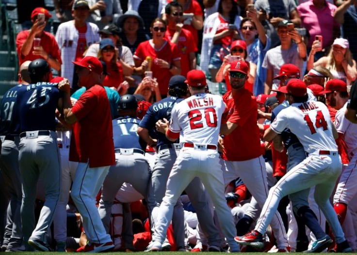 The Seattle Mariners and the Los Angeles Angels clear the benches to exchange punches in a brawl during the second inning of their Major League Baseball game in Anaheim, California
