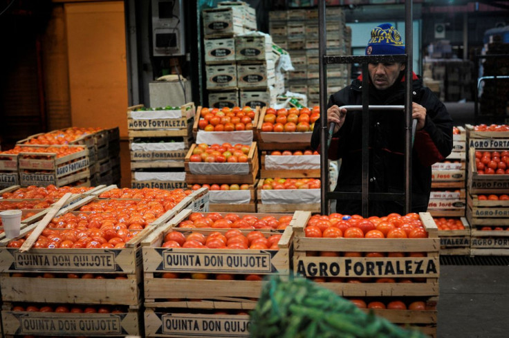 A man holds a hand trolley at the Mercado Central, city's largest wholesale central market which receives produce from the entire country, on the outskirts of Buenos Aires, Argentina June 23, 2022. 