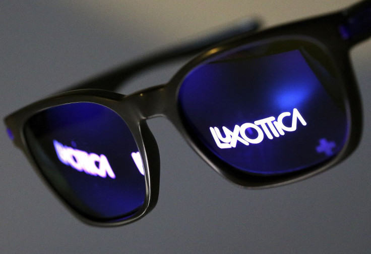 The Luxottica name is reflected in a pair of sunglasses in this photo illustration taken in Rome February 4, 2016. 