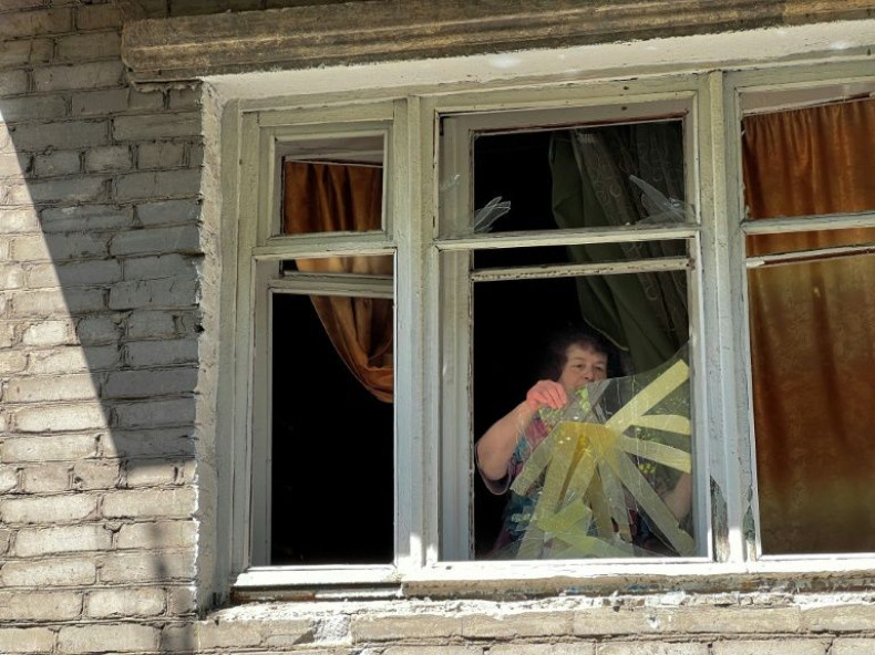 "There's nowhere to hide," says pensioner Tatiana Levchenko, as she removes broken glass from her home in Sloviansk, damaged by Russian shelling