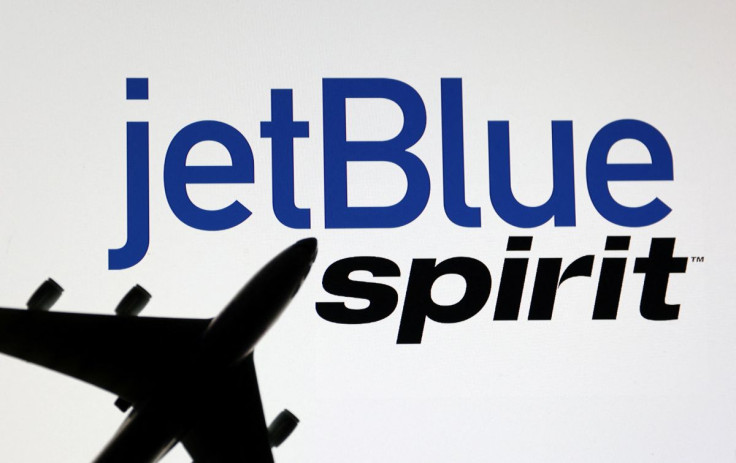 Airplane model is placed on displayed Spirit Airlines and jetBlue Airways logos in this illustration taken, June 21, 2022.