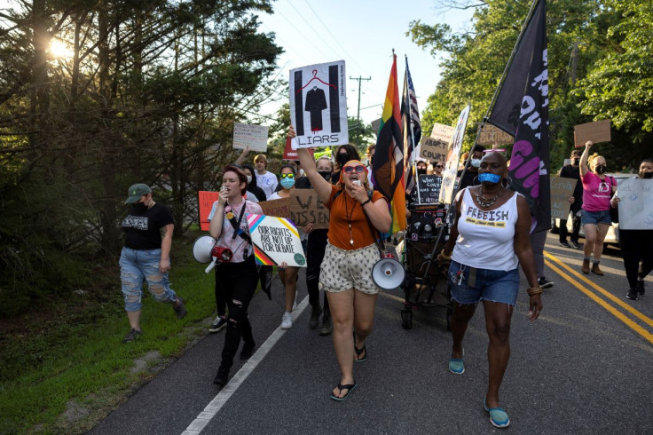Abortion rights activists march to the home of United States Supreme Court Justice Samuel Alito's home in Alexandria, Virginia, U.S., June 27, 2022. 