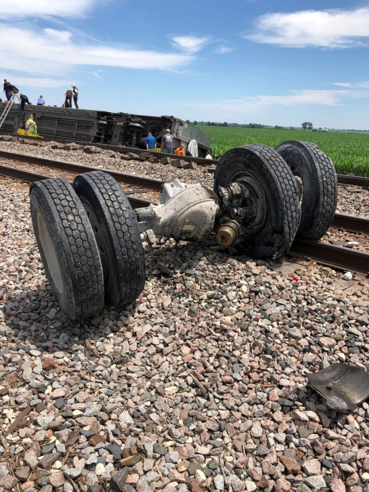 A view of an overturned locomotive following an Amtrak train derailment after it hit a dump truck at an uncontrolled crossing, near Mendon, Missouri, U.S., June 27, 2022 in this picture obtained from social media. Dax McDonald/via REUTERS 