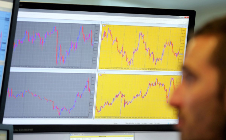 A trader looks at screens with graphs and tables at the Diamond trading academy in Nice, France, September 30, 2016.