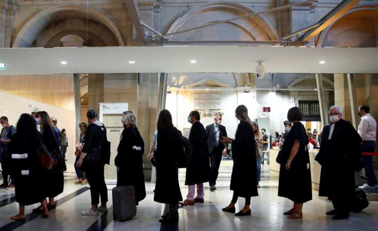 Lawyers arrive for the start of the trial of the Paris' November 2015 attacks at the Paris courthouse on the Ile de la Cite, in Paris, France, September 8, 2021.