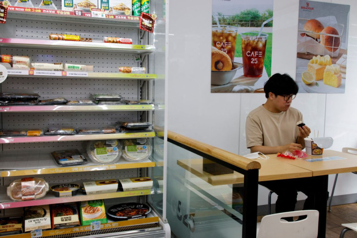 An office worker eats his lunch at a convenience store in Seoul, South Korea, June 24, 2022. 