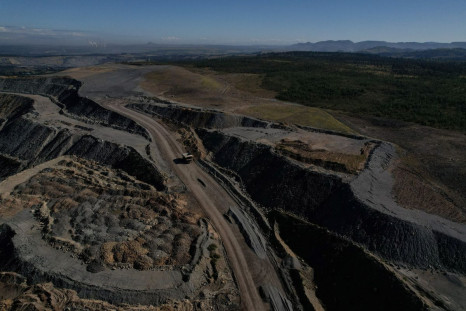 The edge of Glencore's Mount Owen coal mine and adjacent rehabilitated land are pictured in Ravensworth, Australia, June 21, 2022. Picture taken June 21, 2022. Picture taken with a drone.  