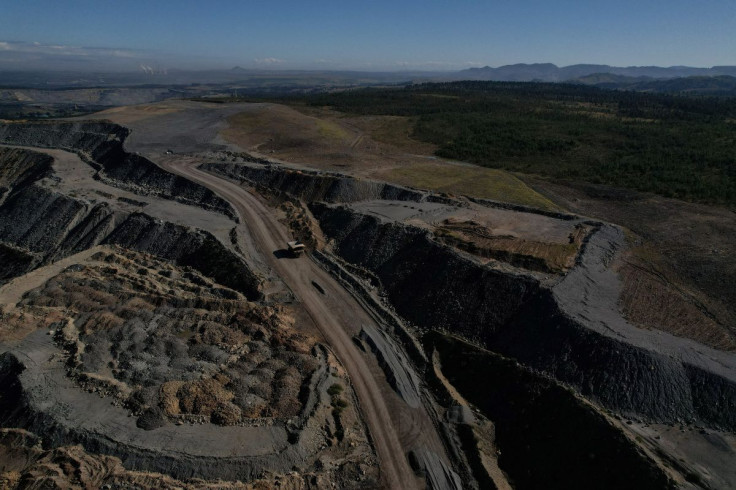 The edge of Glencore's Mount Owen coal mine and adjacent rehabilitated land are pictured in Ravensworth, Australia, June 21, 2022. Picture taken June 21, 2022. Picture taken with a drone.