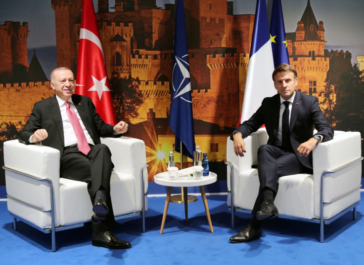 Turkey's President Tayyip Erdogan meets with France's President Emmanuel Macron on the sidelines of a NATO summit in Madrid, Spain June 29, 2022. Murat Cetinmuhurdar/Turkish Presidential Press Office/Handout via REUTERS  