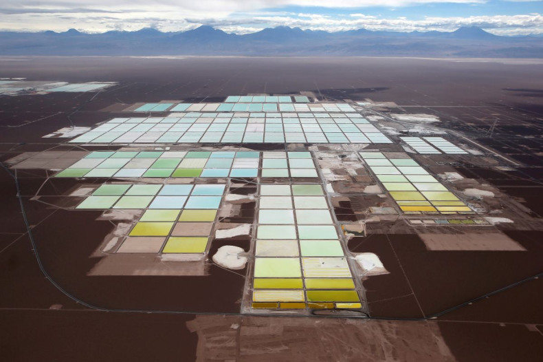An aerial view shows the brine pools and processing areas of the Soquimich (SQM) lithium mine on the Atacama salt flat in the Atacama desert of northern Chile, January 10, 2013.