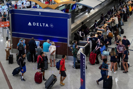 Passengers are seen at the Delta Air Lines check in area before their flights at Hartsfield-Jackson Atlanta International Airport in Atlanta, Georgia, U.S. June 28, 2022. 