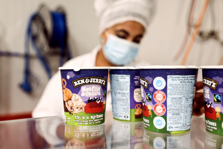 Tubs of ice-cream are seen as a labourer works at Ben & Jerry's factory in Be'er Tuvia, Israel July 20, 2021.