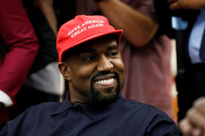 Rapper Kanye West smiles during a meeting with U.S. President Donald Trump to discuss criminal justice reform at the White House in Washington, U.S., October 11, 2018. 