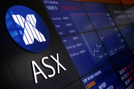 A board displaying stock prices is seen at the Australian Securities Exchange (ASX) in Sydney, Australia, February 9, 2018.   