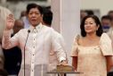 Ferdinand "Bongbong" Marcos Jr., the son and namesake of the late dictator Ferdinand Marcos, takes oath beside his wife Louise Araneta-Marcos during the inauguration ceremony at the National Museum in Manila, Philippines, June 30, 2022. 
