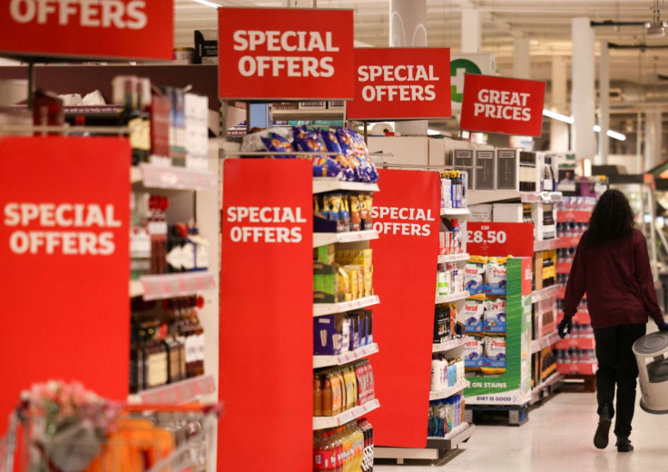 A employee walks inside a Sainsbury?s supermarket in Richmond, west London, Britain, June 27, 2022. Picture taken June 27, 2022. 