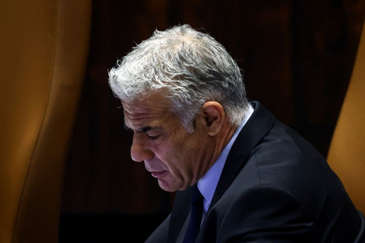 Israeli Foreign Minister Yair Lapid attends a session at the plenum at the Knesset, Israel's parliament, in Jerusalem June 30, 2022. 