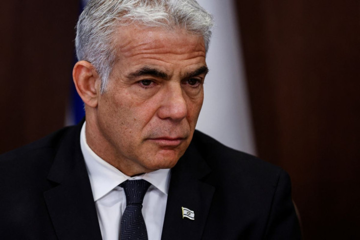 Israeli Foreign Minister Yair Lapid attends a cabinet meeting at the Prime Minister's office in Jerusalem June 26, 2022 