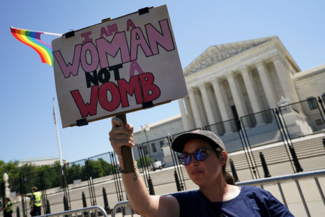 An abortion rights supporter holds up a protest sign in front of the U.S. Supreme Court in Washington, D.C., U.S., June 29, 2022. 