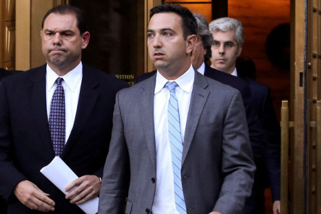 Joseph Percoco (L), former aid to New York Governor Andrew M. Cuomo, walks out of the Manhattan Federal Courthouse in New York, September 22, 2016.  