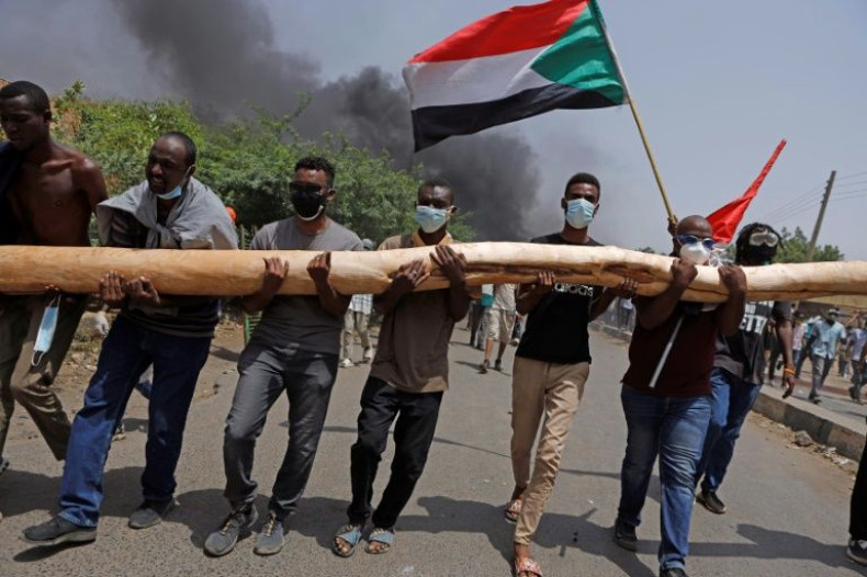 Sudanese anti-coup protesters take part in a demonstration against military rule in Khartoum on June 30, 2022