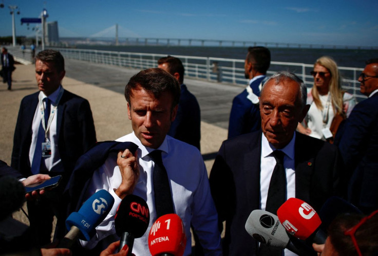 French President Emmanuel Macron speaks to the media next to Portugal President Marcelo Rebelo de Sousa during the 2022 U.N. Ocean Conference in Lisbon, Portugal, June 30, 2022. 