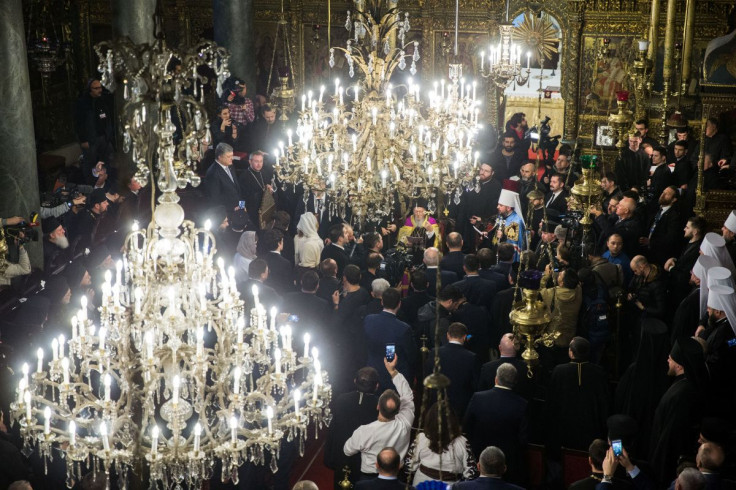 Head of the Orthodox Church of Ukraine Metropolitan Epifaniy and Ecumenical Patriarch Bartholomew attend a ceremony marking the new Ukrainian Orthodox church's independence at St. George's Cathedral, the seat of the Ecumenical Patriarchate in Istanbul, Tu