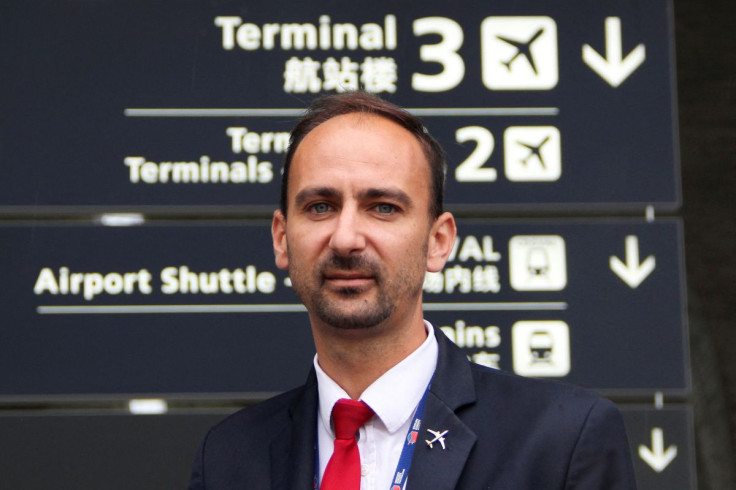 French airport worker Loris Foreman poses during an interview with Reuters at the Paris-Charles de Gaulle airport in Roissy, near Paris, France, June 30, 2022.