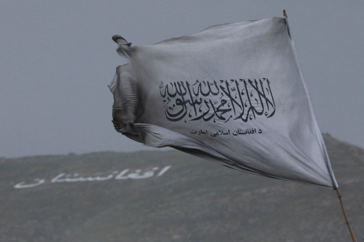 Taliban's flag is seen in a marketplace in Kabul, Afghanistan, May 10, 2022. 