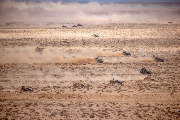 Troops simulated a joint land and air attack against enemy columns in a live fire exercise