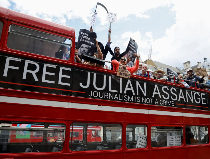 Protesters ride on a bus during a 'Free Assange' demonstration to mark WikiLeaks founder Julian Assange's birthday, in London, Britain, July 1, 2022.