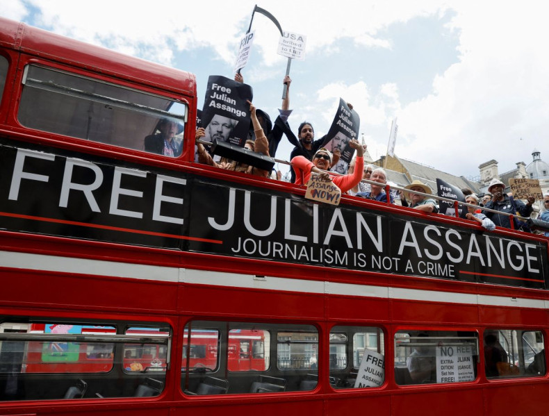 Protesters ride on a bus during a 'Free Assange' demonstration to mark WikiLeaks founder Julian Assange's birthday, in London, Britain, July 1, 2022. 