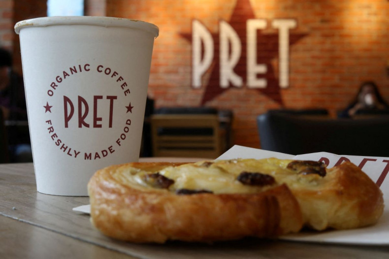 A coffee and a pastry are seen on a table inside a Pret A Manger store in Liverpool, Britain, September 22, 2021. 