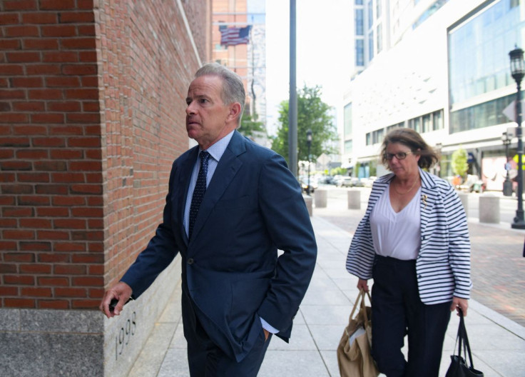 Georgetown University's former head tennis coach Gordon Ernst arrives at the federal courthouse for a sentencing hearing for his role in the vast U.S. college admissions fraud scheme called "Varsity Blues," in Boston, Massachusetts, U.S., July 1, 2022.