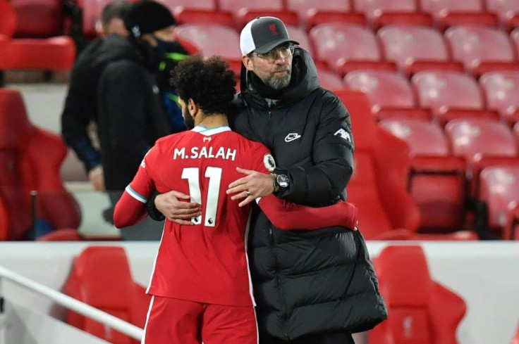 Jurgen Klopp (right) believes the best of Mohamed Salah (left) is still to come