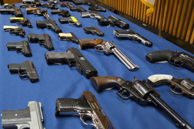 Confiscated illegal guns are displayed during a news conference at New York City Police (NYPD) Headquarters in New York, October 27, 2015. 