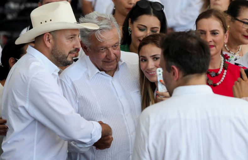 Mexico's President Andres Manuel Lopez Obrador poses for a selfie during the inauguration of the Dos Bocas refinery from the Mexican state-run oil producer Petroleos Mexicanos (PEMEX) in Paraiso, Tabasco state, Mexico, July 1, 2022. 